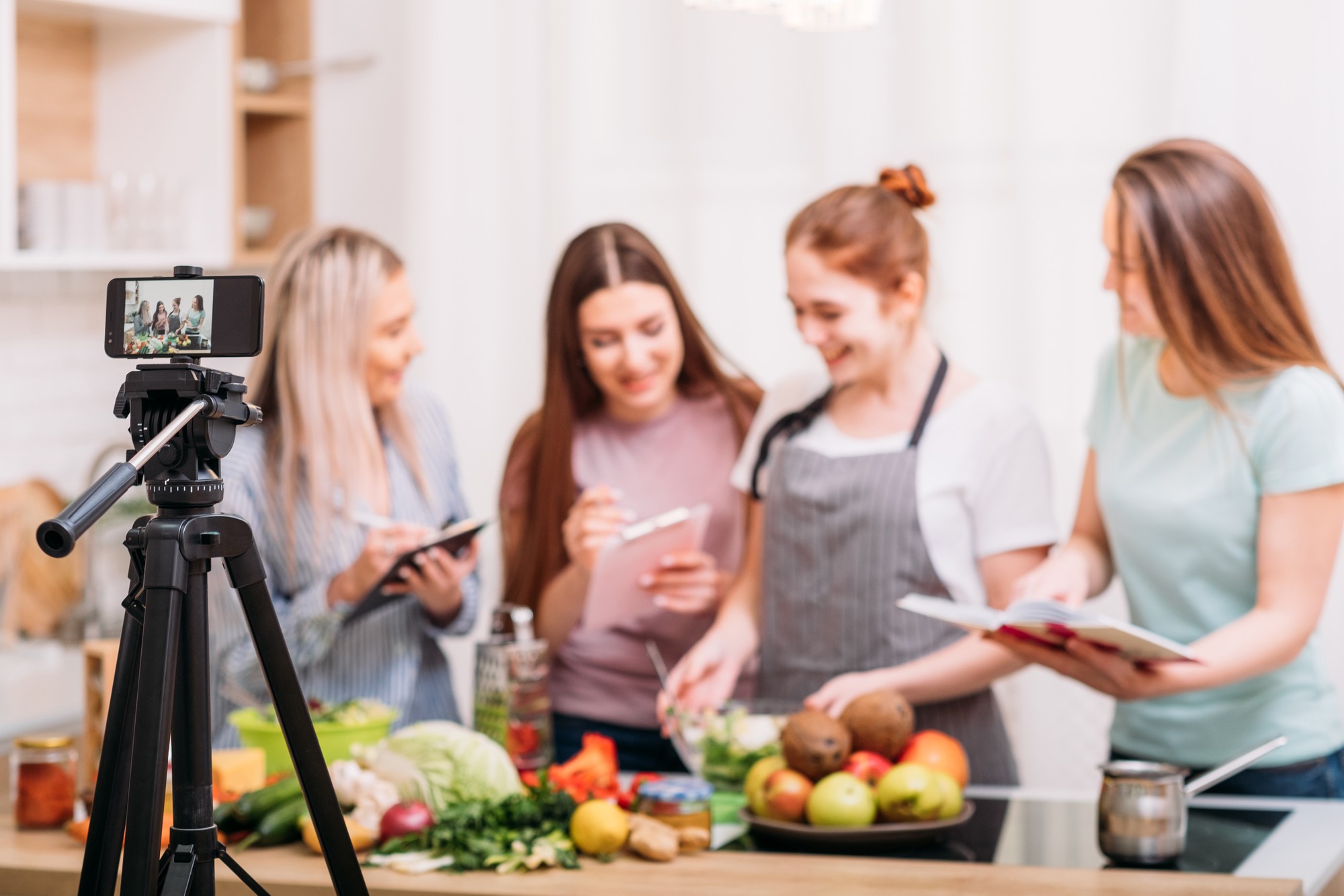 Small group live streaming a cooking demo