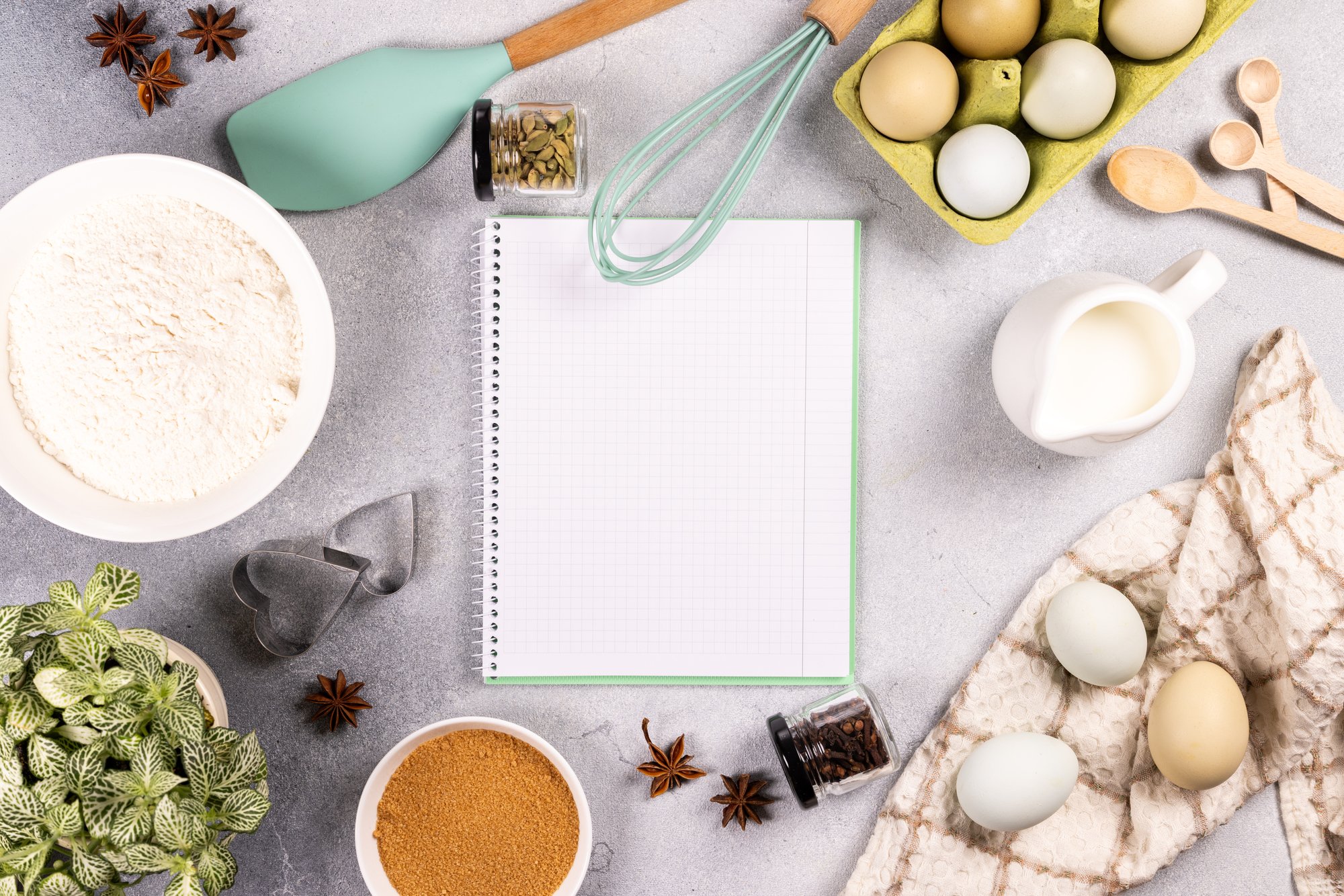 Flat lay of recipe cards and measuring tools